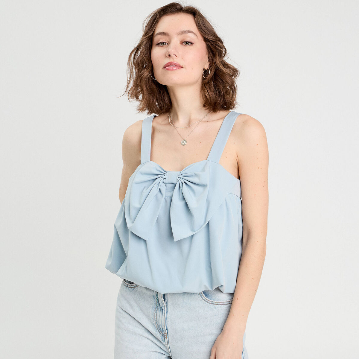 Débardeur effet boule et noeud bleu clair femme