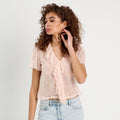 Top dentelle et volants rose clair femme