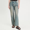 Jeans droit sangle arrière denim bleach femme