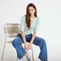 Pull manches courtes boutons brodés vert pastel femme
