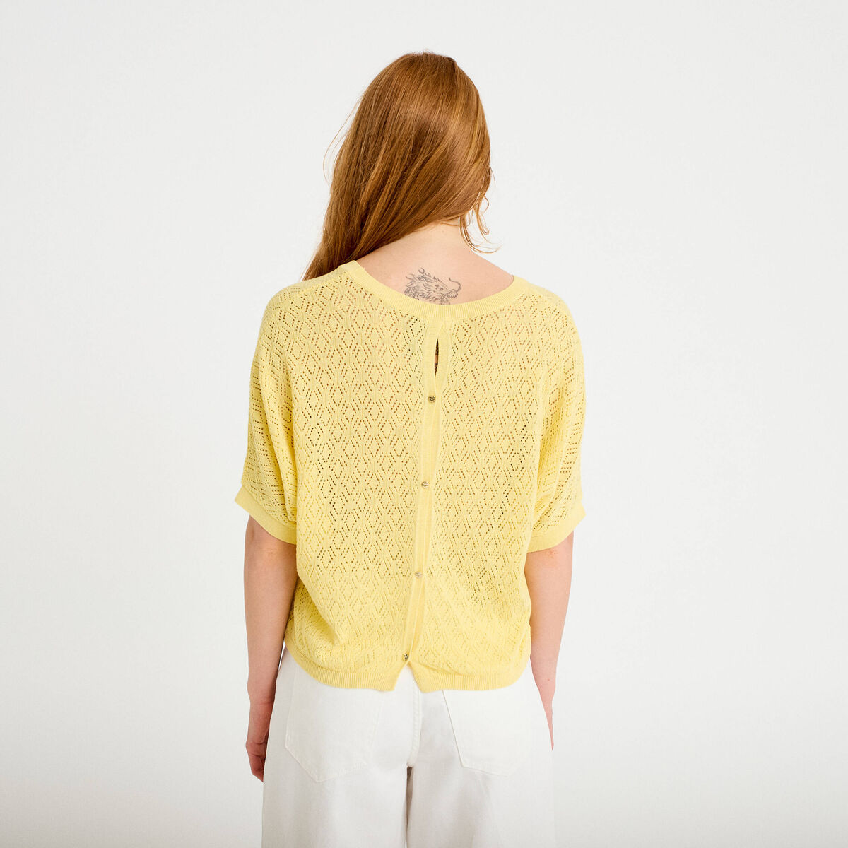 Pull ajouré col v manches courtes jaune pastel femme