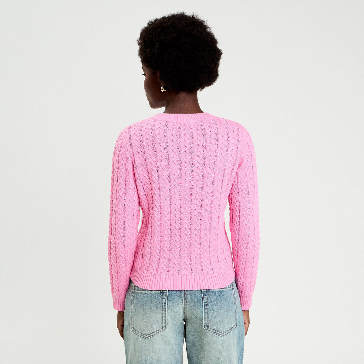 Pull torsadé rose femme