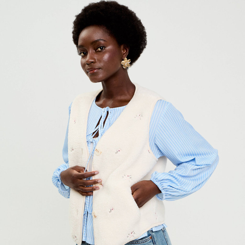 Gilet sans manches brodé effet polaire blanc femme
