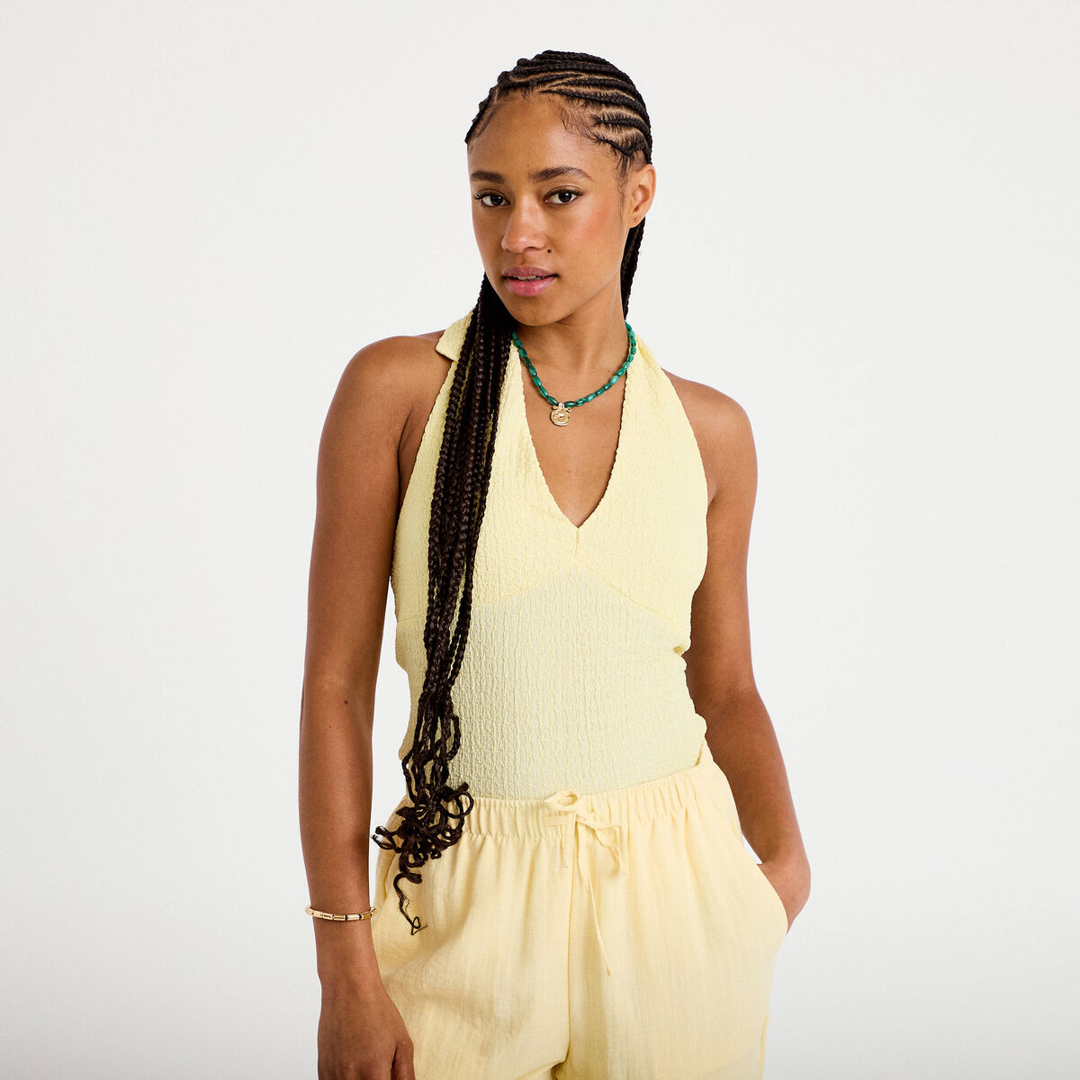 Top cintré sans manches avec relief jaune pastel femme