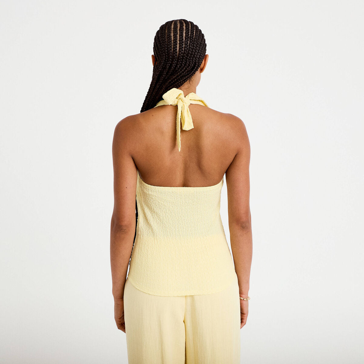 Top cintré sans manches avec relief jaune pastel femme