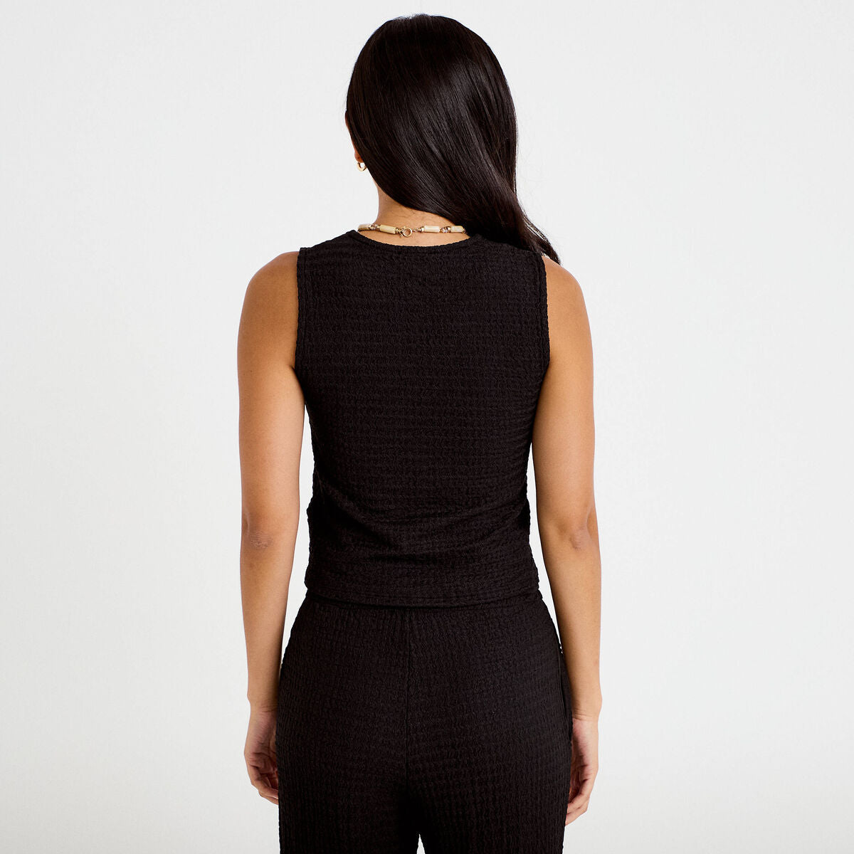 Gilet cintré sans manches col v noir femme