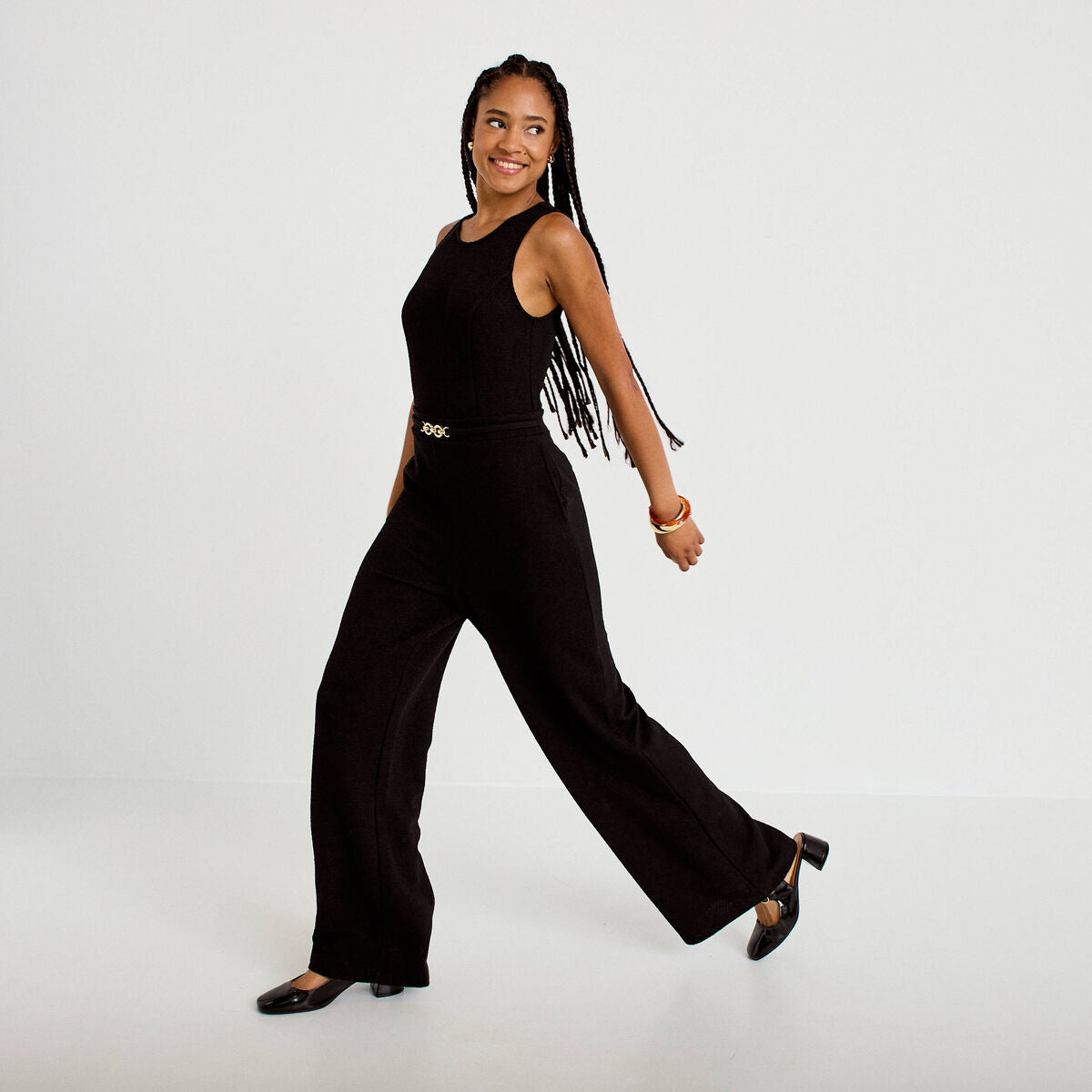 Combinaison large sans manches ceinturée noir femme