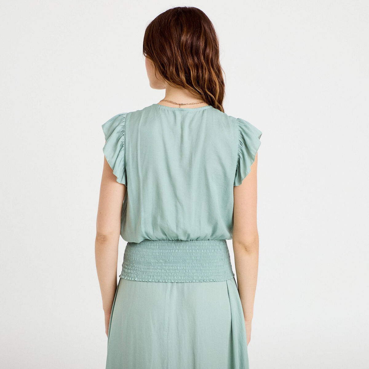 Blouse cintrée col v manches courtes vert pastel femme