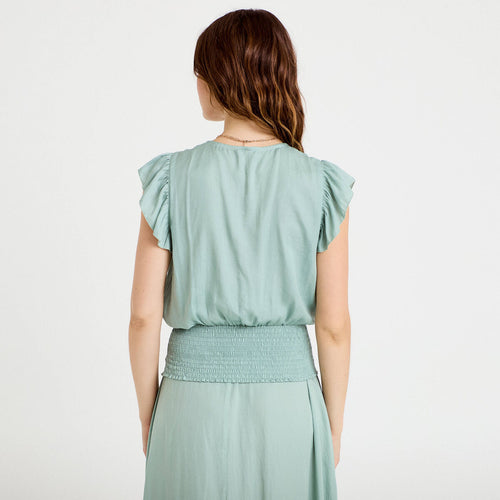 Blouse cintrée col v manches courtes vert pastel femme