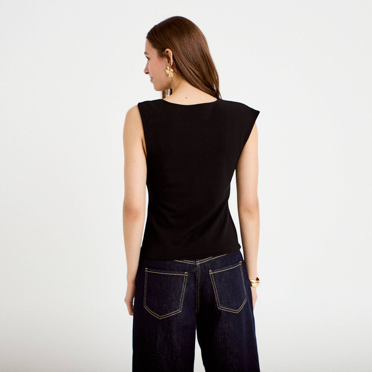 Top asymétrique détail bijou noir femme