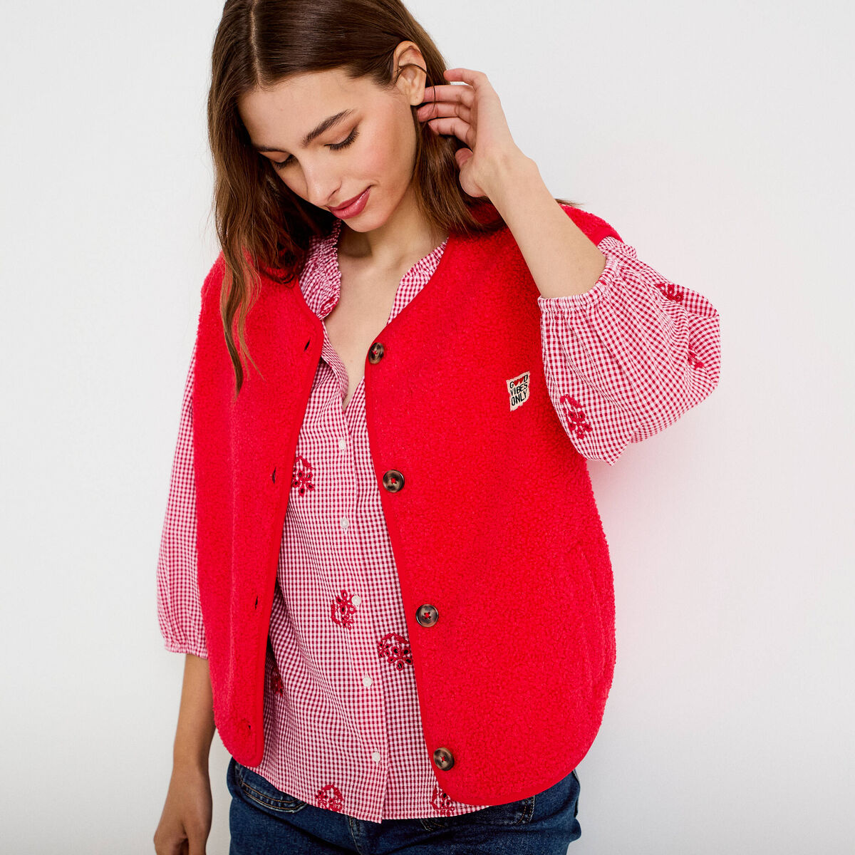 Gilet sans manches effet polaire rouge femme