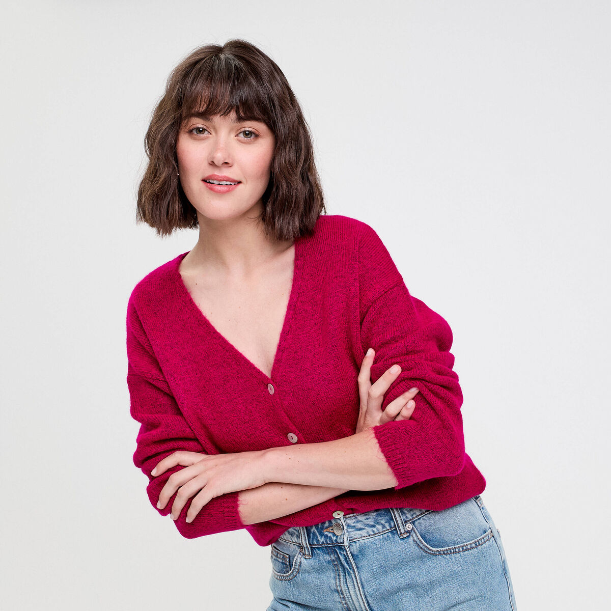 Gilet boutonné avec col en V rose fushia femme